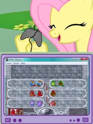 Size: 562x752 | Tagged: safe, fluttershy, pegasus, pony, controller, exploitable meme, eyes closed, female, gamershy, happy, hoof hold, mare, meme, microsoft entertainment pack: the puzzle collection, mixed genetics, obligatory pony, open mouth, pink mane, screen, smiling, tv meme, yellow coat