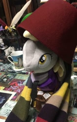 Size: 551x876 | Tagged: safe, artist:schwarz, derpy hooves, fez, hat, plushie