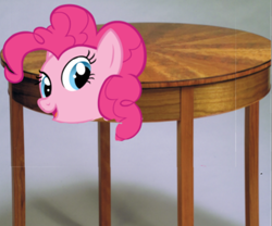 Size: 449x374 | Tagged: safe, pinkie pie, earth pony, pony, female, mare, pink coat, solo, table, wat