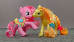 Size: 820x470 | Tagged: safe, pinkie pie, earth pony, pony, brushable, hasbro, lanard, official, photo, pony tails, strawberry vine, toy