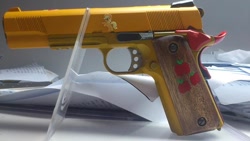 Size: 720x405 | Tagged: safe, applejack, airsoft, apple, gun, gunified, irl, m1911, my little arsenal, pistol