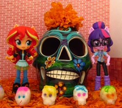 Size: 1644x1459 | Tagged: safe, artist:whatthehell!?, applejack, sci-twi, sunset shimmer, twilight sparkle, equestria girls, all saints day, boots, calaverita, cempasúchil, clothes, dia de los muertos, doll, dress, equestria girls minis, flower, irl, jacket, photo, ponied up, shoes, skull, toy
