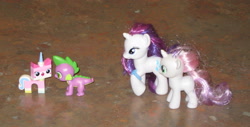 Size: 2605x1326 | Tagged: safe, artist:cheerbearsfan, rarity, spike, sweetie belle, blind bag, brushable, crossover, crossover shipping, irl, lego, photo, shipping, the lego movie, toy, unikitty