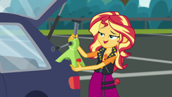 Size: 1920x1080 | Tagged: safe, screencap, sunset shimmer, better together, driving miss shimmer, driving miss shimmer: applejack, equestria girls, apple jack (tool), car, pun, solo, visual pun