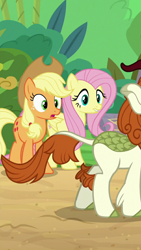 Size: 720x1280 | Tagged: safe, derpibooru import, screencap, applejack, autumn blaze, fluttershy, earth pony, kirin, pegasus, pony, sounds of silence, cropped, lip bite, out of context, staring at flank