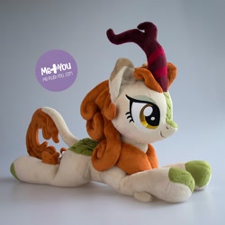 Size: 1600x1600 | Tagged: safe, alternate version, artist:meplushyou, autumn blaze, kirin, sounds of silence, cloven hooves, female, irl, photo, plushie, prone, smiling, solo, watermark