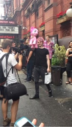 Size: 550x977 | Tagged: safe, artist:calfuckinhood, pinkie pie, human, irl, irl human, michael clifford, photo, plushie