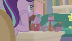 Size: 1369x790 | Tagged: safe, screencap, ocellus, starlight glimmer, earth pony, pony, unicorn, student counsel, bowl, chocolate, desk, disguise, disguised changeling, female, food, guidance counselor, hot chocolate, mare, mug, pony ocellus, starlight's office, tea