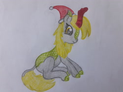 Size: 4128x3096 | Tagged: safe, artist:juani236, derpy hooves, kirin, christmas, hand drawing, hat, holiday, kirin-ified, paper, santa hat, sitting, solo, species swap, traditional art