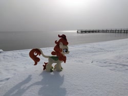 Size: 2048x1536 | Tagged: safe, artist:hihin1993, autumn blaze, irl, japan, kirin in real life, photo, pier, plushie, snow, solo, sun, water, winter