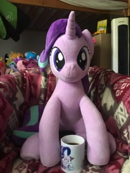 Size: 3024x4032 | Tagged: safe, artist:nekokevin, starlight glimmer, pony, unicorn, series:nekokevin's glimmy, armchair, coffee, coffee mug, female, irl, looking at you, mare, mug, photo, plushie, sitting, smiling, underhoof