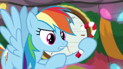 Size: 1280x720 | Tagged: safe, derpibooru import, screencap, rainbow dash, pegasus, pony, the great escape room, candy, candy cane, food