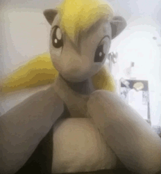 Size: 579x623 | Tagged: safe, artist:agatrix, derpy hooves, pegasus, pony, animated, cute, derp, derpabetes, female, gif, irl, looking at you, loop, mare, perfect loop, photo, plushie, ponies in real life, smiling, solo, tail wag