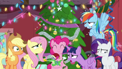 Size: 1280x720 | Tagged: safe, derpibooru import, screencap, applejack, fluttershy, gummy, pinkie pie, rainbow dash, rarity, twilight sparkle, twilight sparkle (alicorn), alicorn, earth pony, pegasus, pony, unicorn, the great escape room, christmas, christmas lights, christmas tree, holiday, mane six, tree