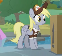 Size: 326x295 | Tagged: safe, screencap, derpy hooves, pegasus, pony, the point of no return, box, clothes, cropped, cute, derpabetes, female, hat, mailmare, mare, smiling, solo