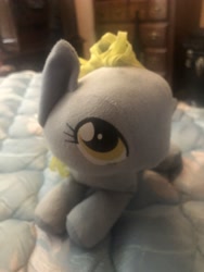 Size: 3024x4032 | Tagged: safe, artist:undeadponysoldier, photographer:undeadponysoldier, derpy hooves, pegasus, pony, adorable face, bed, cute, eyelashes, female, irl, lying down, lying on bed, mare, photo, plushie