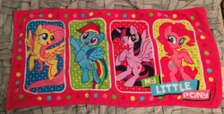 Size: 2996x1536 | Tagged: safe, derpibooru import, fluttershy, pinkie pie, rainbow dash, twilight sparkle, twilight sparkle (alicorn), alicorn, pony, cute, dashabetes, irl, merchandise, photo, towel