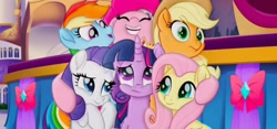 Size: 1280x600 | Tagged: safe, derpibooru import, screencap, applejack, fluttershy, pinkie pie, rainbow dash, rarity, twilight sparkle, twilight sparkle (alicorn), alicorn, earth pony, pegasus, pony, unicorn, group hug, happy, hug, low quality, mane six