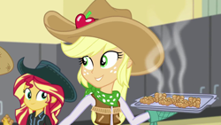 Size: 1920x1080 | Tagged: safe, screencap, applejack, sunset shimmer, dance magic, equestria girls, spoiler:eqg specials, apple fritter (food), baking, baking sheet, cowboy hat, cowgirl, cute, discovery family logo, food, hat, imagine spot, jackabetes, oven mitt, oven mitts, shimmerbetes, smiling, stetson