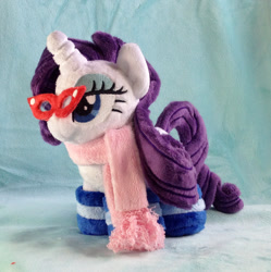 Size: 895x900 | Tagged: safe, artist:hollyivydesigns, rarity, clothes, female, glasses, irl, lidded eyes, photo, plushie, scarf, socks, solo, striped socks