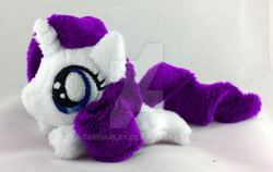 Size: 800x504 | Tagged: safe, artist:theharley, rarity, beanie (plushie), filly, filly rarity, irl, mini, photo, plushie, prone, solo, watermark