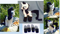 Size: 1366x768 | Tagged: safe, artist:darkcherry87, rarity, clothes, irl, lidded eyes, photo, plushie, socks, solo, striped socks