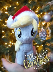 Size: 1000x1352 | Tagged: safe, artist:meplushyou, derpy hooves, pegasus, pony, background pony, christmas, christmas tree, hand, holding a pony, holiday, irl, photo, plushie, tree