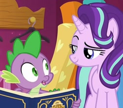 Size: 818x720 | Tagged: safe, edit, edited screencap, screencap, spike, starlight glimmer, dragon, pony, unicorn, a-dressing memories, spoiler:a-dressing memories, spoiler:mlp friendship is forever, book, cropped, lidded eyes, smiling, smug, winged spike