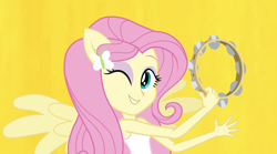 Size: 1280x714 | Tagged: safe, screencap, fluttershy, equestria girls, rainbow rocks, musical instrument, ponied up, solo, tambourine