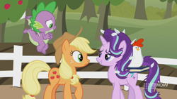 Size: 1280x720 | Tagged: safe, screencap, applejack, spike, starlight glimmer, bird, chicken, dragon, earth pony, pony, unicorn, harvesting memories, spoiler:harvesting memories, spoiler:mlp friendship is forever, apple, apple tree, bedroom eyes, book, female, flying, looking at each other, mare, sweet apple acres, sweet apple acres barn, tree