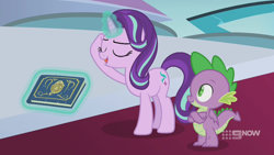 Size: 1280x720 | Tagged: safe, screencap, spike, starlight glimmer, dragon, pony, unicorn, memories and more, spoiler:memories and more, spoiler:mlp friendship is forever, 9now, book, crossed arms, duo, eyes closed, levitation, magic, magic aura, scrapbook, telekinesis, winged spike