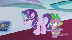 Size: 1280x720 | Tagged: safe, screencap, spike, starlight glimmer, dragon, pony, unicorn, memories and more, spoiler:memories and more, spoiler:mlp friendship is forever, 9now, book, crossed arms, duo, levitation, magic, magic aura, scrapbook, telekinesis, winged spike