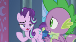 Size: 1280x720 | Tagged: safe, screencap, spike, starlight glimmer, dragon, pony, unicorn, memories and more, spoiler:memories and more, spoiler:mlp friendship is forever, 9now, duo, looking at each other, magic, mid-blink screencap, telekinesis, winged spike