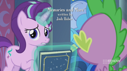 Size: 1280x720 | Tagged: safe, screencap, spike, starlight glimmer, dragon, pony, unicorn, memories and more, spoiler:memories and more, spoiler:mlp friendship is forever, 9now, book, duo, levitation, looking at you, magic, magic aura, scrapbook, telekinesis, winged spike, worried