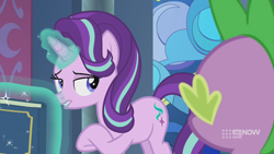 Size: 1280x720 | Tagged: safe, screencap, spike, starlight glimmer, dragon, pony, unicorn, memories and more, spoiler:memories and more, spoiler:mlp friendship is forever, 9now, bedroom eyes, book, duo, levitation, lip bite, looking at each other, magic, magic aura, scrapbook, telekinesis, winged spike