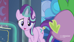 Size: 1280x720 | Tagged: safe, screencap, spike, starlight glimmer, dragon, pony, unicorn, memories and more, spoiler:memories and more, spoiler:mlp friendship is forever, 9now, book, duo, levitation, looking at you, magic, magic aura, scrapbook, telekinesis, winged spike