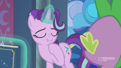 Size: 1280x720 | Tagged: safe, screencap, spike, starlight glimmer, dragon, pony, unicorn, memories and more, spoiler:memories and more, spoiler:mlp friendship is forever, 9now, book, duo, eyes closed, levitation, magic, magic aura, mid-blink screencap, scrapbook, smiling, telekinesis, winged spike