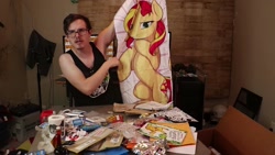 Size: 1920x1080 | Tagged: safe, artist:theparagon, sunset shimmer, human, pony, unicorn, bad unboxing, bedroom eyes, body pillow, female, idubbbz, irl, irl human, mare, photo, youtube link, youtuber