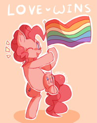 Size: 839x1063 | Tagged: safe, artist:sunomii, pinkie pie, earth pony, pony, bipedal, blush sticker, blushing, cute, diapinkes, flag, gay pride, gay pride flag, heart, hoof hold, lgbt, looking at you, lovewins, one eye closed, open mouth, orange background, pride, raised leg, simple background, smiling, solo, wink