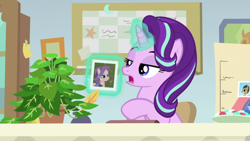 Size: 1920x1080 | Tagged: safe, screencap, doctor whooves, phyllis, spoiled rich, starlight glimmer, pony, unicorn, a horse shoe-in, dismissed, female, glowing horn, levitation, lidded eyes, magic, magic aura, mare, philodendron, photo, potted plant, raised eyebrows, solo, talking, talking to objects, telekinesis