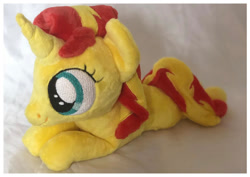 Size: 800x566 | Tagged: safe, artist:the-plushatiers, sunset shimmer, pony, unicorn, female, filly, irl, photo, plushie, prone, smiling