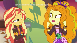 Size: 537x300 | Tagged: safe, screencap, adagio dazzle, sunset shimmer, better together, equestria girls, sunset's backstage pass!, crossed arms, discovery kids, smugset shimmer, spanish, spiked headband