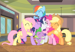 Size: 1345x940 | Tagged: safe, derpibooru import, screencap, applejack, fluttershy, pinkie pie, rainbow dash, rarity, spike, twilight sparkle, twilight sparkle (alicorn), alicorn, dragon, earth pony, pegasus, pony, unicorn, rarity takes manehattan, cropped, cute, eyes closed, fangs, female, freckles, group hug, hug, male, mane seven, mane six, mare, open mouth, smiling