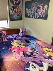 Size: 3024x4032 | Tagged: safe, derpibooru import, applejack, cheerilee, fluttershy, pinkie pie, rainbow dash, rarity, spike, twilight sparkle, twilight sparkle (alicorn), unicorn twilight, alicorn, earth pony, pegasus, pony, unicorn, my little pony: the movie, applejack's hat, bedroom, build-a-bear, cowboy hat, hat, irl, mane seven, mane six, merchandise, my little pony logo, photo, plushie