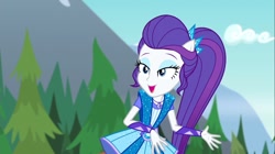 Size: 1100x618 | Tagged: safe, screencap, rarity, equestria girls, legend of everfree, bedroom eyes, jewelry, mountain, ponied up, solo, sparkles, super ponied up, tree