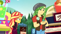 Size: 1280x720 | Tagged: safe, screencap, sandalwood, sunset shimmer, equestria girls, equestria girls series, sunset's backstage pass!, spoiler:eqg series (season 2), cellphone, clothes, female, geode of empathy, hands in pockets, jacket, magical geodes, male, music festival outfit, phone, smartphone, smiling