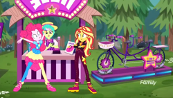 Size: 1366x768 | Tagged: safe, screencap, pinkie pie, sunset shimmer, better together, equestria girls, sunset's backstage pass!, belle barker, bicycle, booth, carny, discovery family logo, forest, geode of empathy, geode of sugar bombs, joy buzzer, magical geodes, prize, shoes, sneakers, tandem bicycle