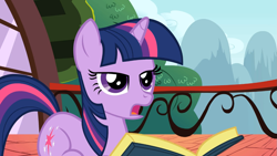 Size: 1365x768 | Tagged: safe, derpibooru import, screencap, twilight sparkle, unicorn twilight, pony, unicorn, applebuck season, balcony, book, female, frown, lidded eyes, mare, open mouth, ponyloaf, prone, solo, unamused