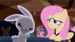 Size: 1645x926 | Tagged: safe, screencap, angel bunny, fluttershy, pegasus, pony, scare master, angel is a bunny bastard, evil, evil grin, grin, pure unfiltered evil, smiling, spoopy