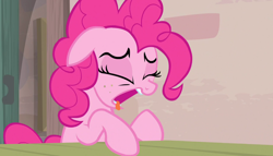 Size: 1258x720 | Tagged: safe, screencap, pinkie pie, earth pony, pony, the cutie map, open mouth, solo, table